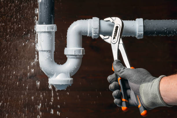 Professional Emergency Plumber technician working in Norwood, MA